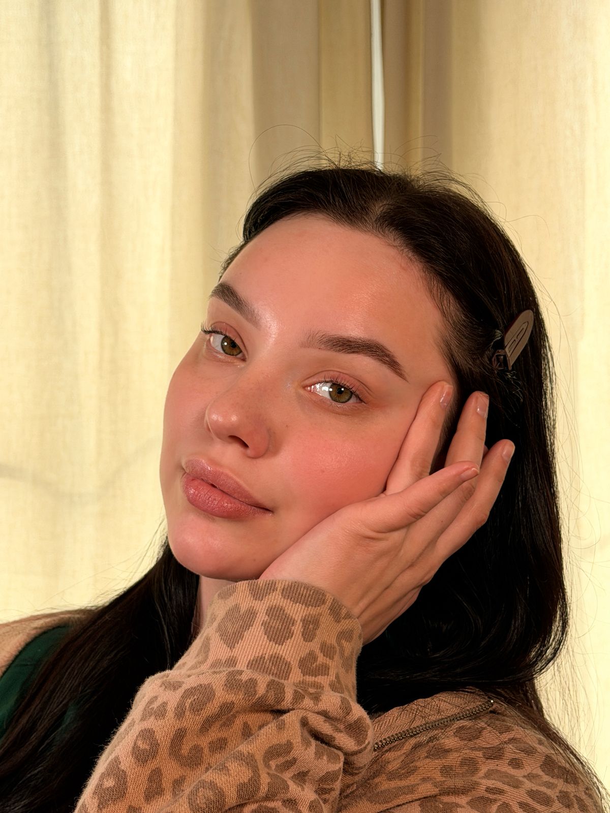 Signature brow sculpt close-up — sharp, brushed-up shape